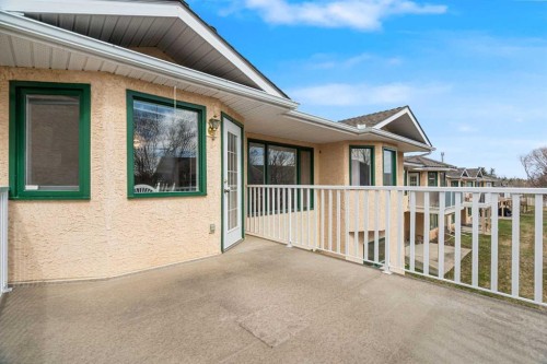 58 Evergreen Bay Sw, Calgary, AB - Outdoor With Deck Patio Veranda With Exterior