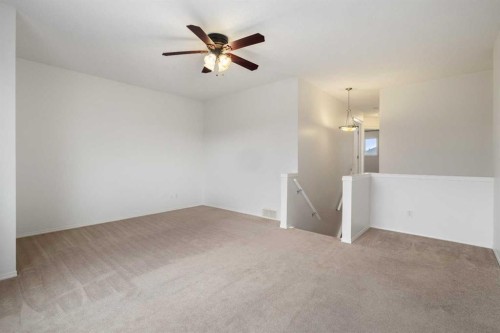 112 Everridge Drive Sw, Calgary, AB - Indoor Photo Showing Other Room