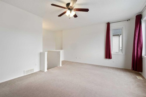 112 Everridge Drive Sw, Calgary, AB - Indoor Photo Showing Other Room