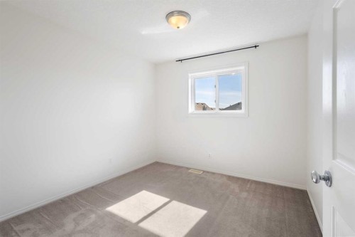 112 Everridge Drive Sw, Calgary, AB - Indoor Photo Showing Other Room