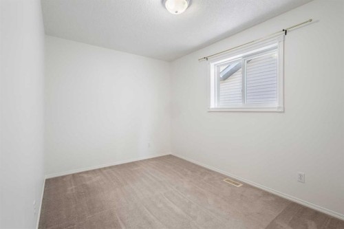 112 Everridge Drive Sw, Calgary, AB - Indoor Photo Showing Other Room