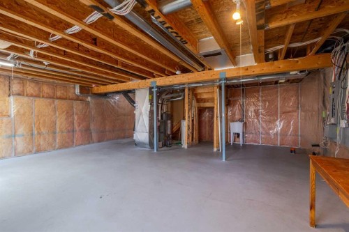 112 Everridge Drive Sw, Calgary, AB - Indoor Photo Showing Basement