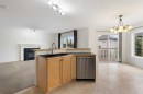 112 Everridge Drive Sw, Calgary, AB  - Indoor With Fireplace 