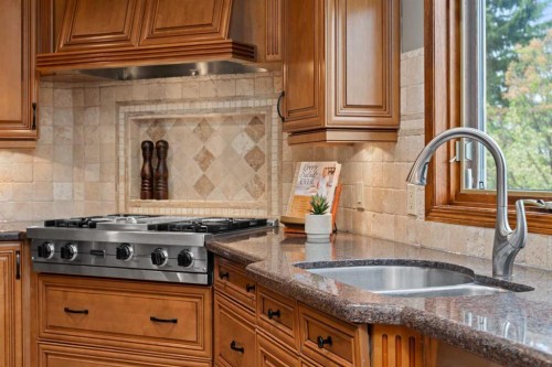 527 Scimitar Bay Nw, Calgary, AB - Indoor Photo Showing Kitchen With Double Sink
