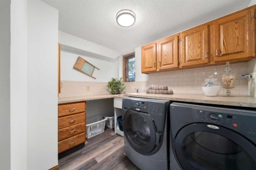 527 Scimitar Bay Nw, Calgary, AB - Indoor Photo Showing Laundry Room
