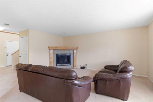 143 Coventry Hills Drive Ne, Calgary, AB - Indoor Photo Showing Living Room With Fireplace
