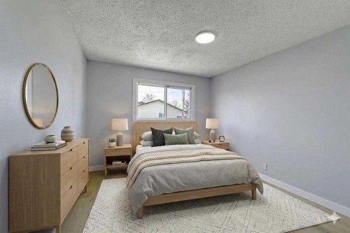 71 Falton Drive Ne, Calgary, AB - Indoor Photo Showing Bedroom