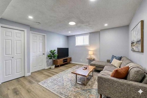 71 Falton Drive Ne, Calgary, AB - Indoor Photo Showing Living Room