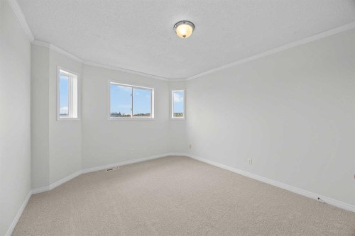 289 Hidden Spring Green Nw, Calgary, AB - Indoor Photo Showing Other Room