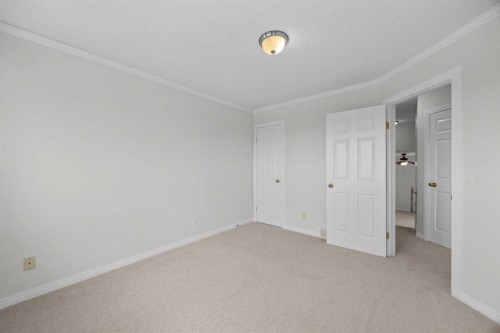 289 Hidden Spring Green Nw, Calgary, AB - Indoor Photo Showing Other Room