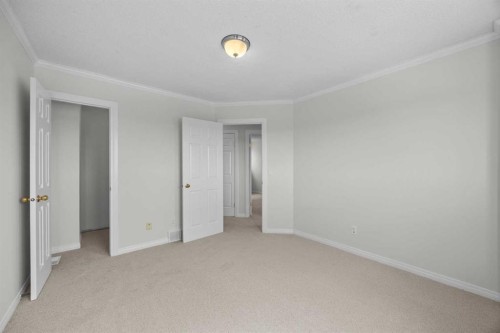 289 Hidden Spring Green Nw, Calgary, AB - Indoor Photo Showing Other Room