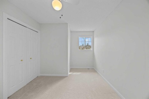289 Hidden Spring Green Nw, Calgary, AB - Indoor Photo Showing Other Room