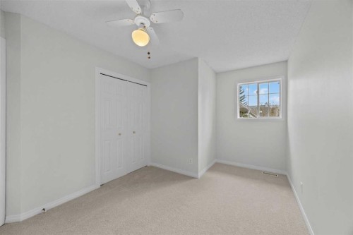 289 Hidden Spring Green Nw, Calgary, AB - Indoor Photo Showing Other Room