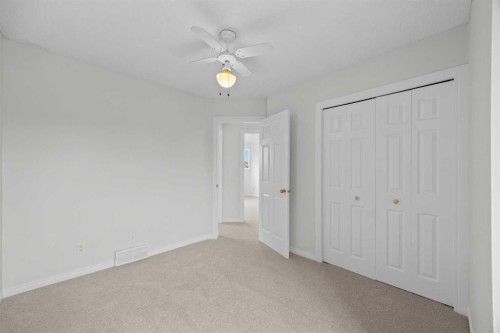 289 Hidden Spring Green Nw, Calgary, AB - Indoor Photo Showing Other Room