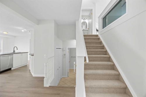 289 Hidden Spring Green Nw, Calgary, AB - Indoor Photo Showing Other Room