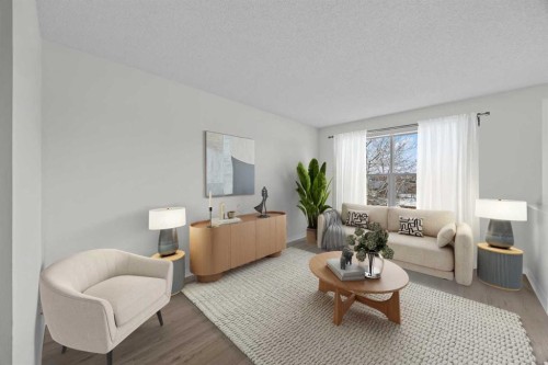 289 Hidden Spring Green Nw, Calgary, AB - Indoor Photo Showing Living Room