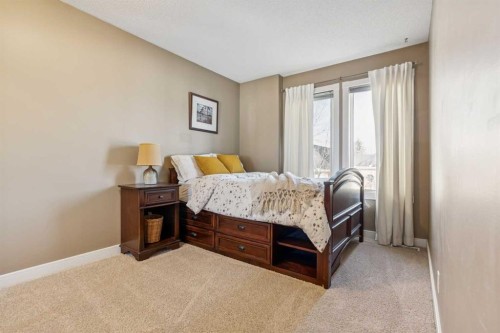 110 Candle Terrace Sw, Calgary, AB - Indoor Photo Showing Bedroom