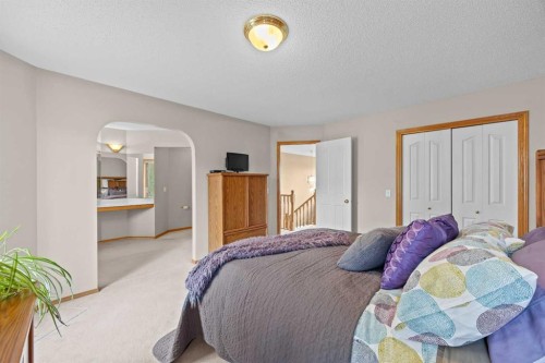 30 Gleneagles View, Cochrane, AB - Indoor Photo Showing Bedroom