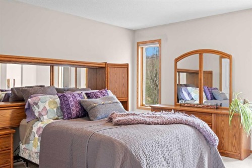 30 Gleneagles View, Cochrane, AB - Indoor Photo Showing Bedroom