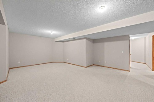30 Gleneagles View, Cochrane, AB - Indoor Photo Showing Other Room