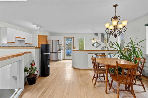 242 Hidden Spring Mews Nw, Calgary, AB - Indoor Photo Showing Dining Room