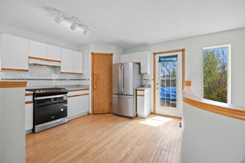 242 Hidden Spring Mews Nw, Calgary, AB - Indoor Photo Showing Kitchen
