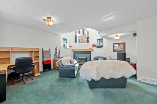 242 Hidden Spring Mews Nw, Calgary, AB - Indoor With Fireplace