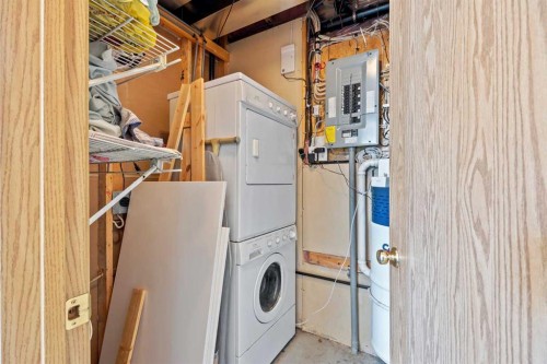 242 Hidden Spring Mews Nw, Calgary, AB - Indoor Photo Showing Laundry Room