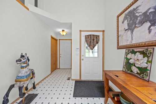 242 Hidden Spring Mews Nw, Calgary, AB - Indoor Photo Showing Other Room