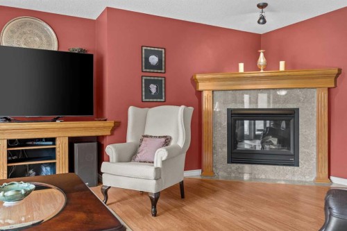 11178 Hidden Valley Drive Nw, Calgary, AB - Indoor Photo Showing Living Room With Fireplace