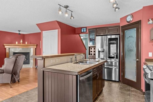11178 Hidden Valley Drive Nw, Calgary, AB - Indoor Photo Showing Kitchen With Double Sink