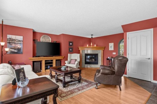 11178 Hidden Valley Drive Nw, Calgary, AB - Indoor Photo Showing Living Room With Fireplace