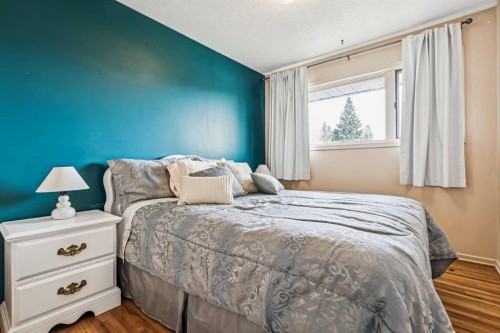 9843 5 Street Se, Calgary, AB - Indoor Photo Showing Bedroom
