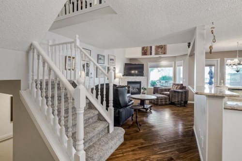 25-200 Sandstone Drive Nw, Calgary, AB - Indoor With Fireplace