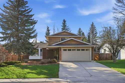 5893 Dalcastle Drive Nw, Calgary, AB - Outdoor With Facade
