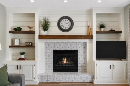 941 Riverview Place Se, Calgary, AB - Indoor Photo Showing Living Room With Fireplace