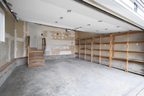 49 Martin Crossing Green Ne, Calgary, AB - Indoor Photo Showing Garage
