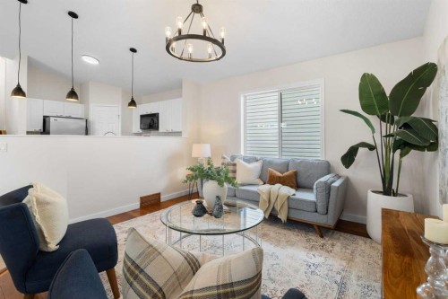 49 Martin Crossing Green Ne, Calgary, AB - Indoor Photo Showing Living Room