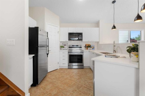 49 Martin Crossing Green Ne, Calgary, AB - Indoor Photo Showing Kitchen With Upgraded Kitchen