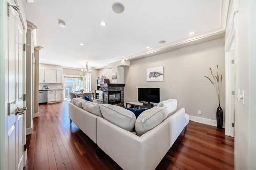 425 36 Avenue Nw, Calgary, AB - Indoor Photo Showing Living Room With Fireplace