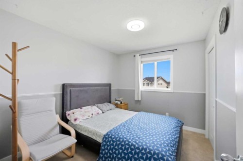39 Panora Square Nw, Calgary, AB - Indoor Photo Showing Bedroom