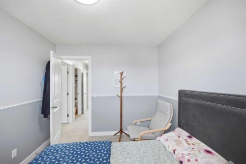39 Panora Square Nw, Calgary, AB - Indoor Photo Showing Bedroom