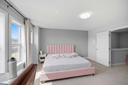 39 Panora Square Nw, Calgary, AB - Indoor Photo Showing Bedroom