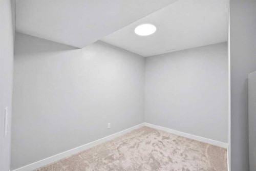 39 Panora Square Nw, Calgary, AB - Indoor Photo Showing Other Room