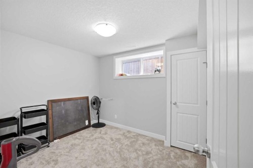 39 Panora Square Nw, Calgary, AB - Indoor Photo Showing Other Room