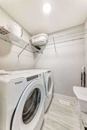 15053 37 Street Sw, Calgary, AB - Indoor Photo Showing Laundry Room