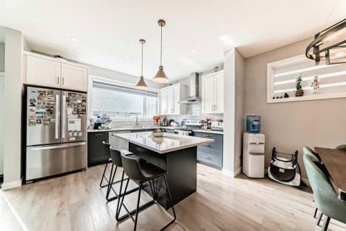 15053 37 Street Sw, Calgary, AB - Indoor Photo Showing Kitchen With Stainless Steel Kitchen With Upgraded Kitchen