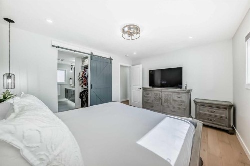 9215 Allison Drive Se, Calgary, AB - Indoor Photo Showing Bedroom