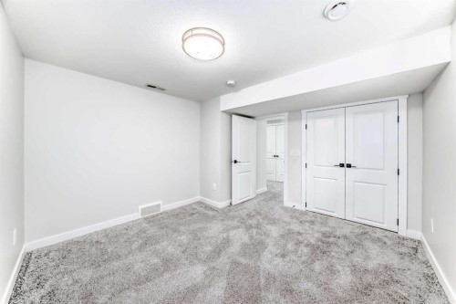 9215 Allison Drive Se, Calgary, AB - Indoor Photo Showing Other Room