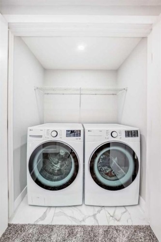9215 Allison Drive Se, Calgary, AB - Indoor Photo Showing Laundry Room